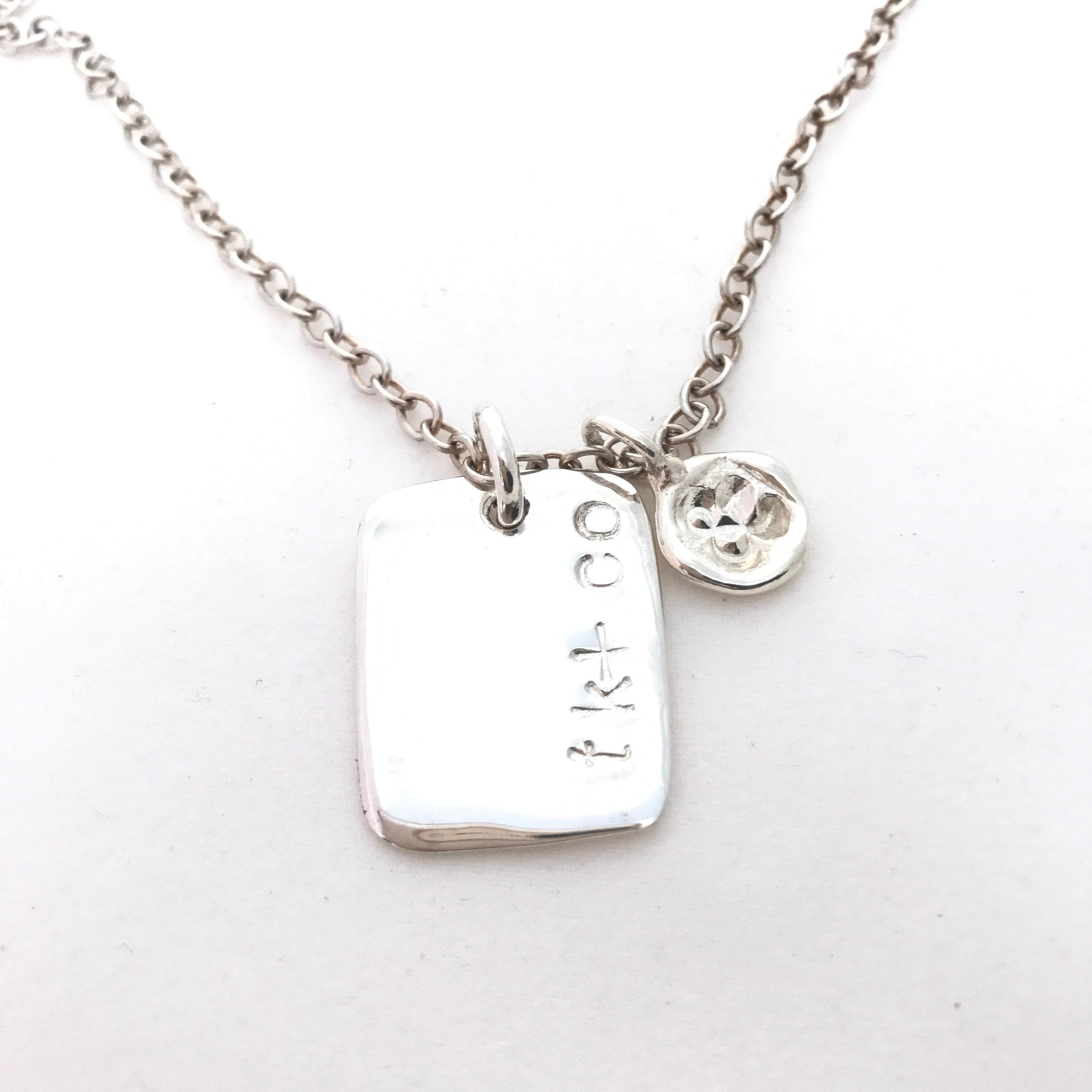 large sterling silver dog tag