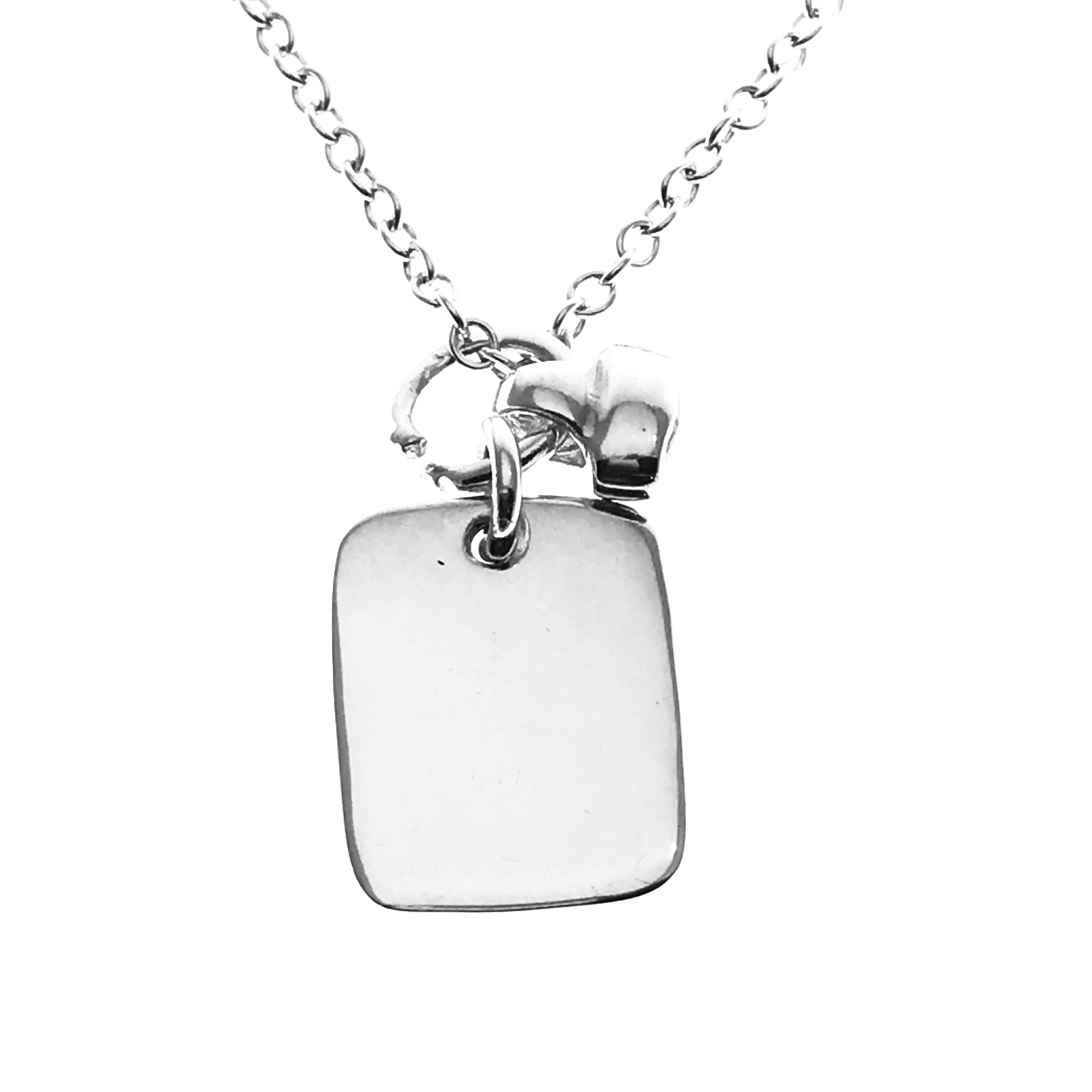 silver tag and bell