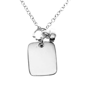 silver tag and bell